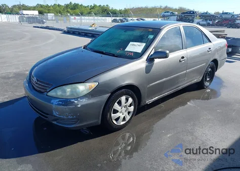 2002 Toyota Camry Xle z USA, uszkodzony, nr VIN 4T1BE32K02U614449